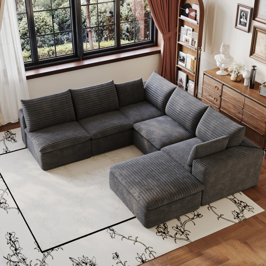 Divano modulare ULEVR in tessuto grigio scuro con supporto in schiuma e design componibile