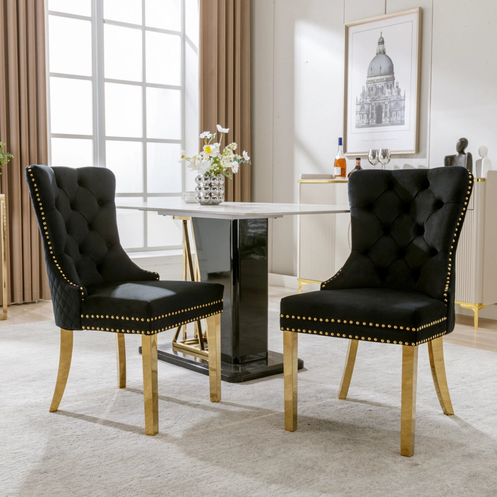 Sedia da pranzo in velluto nero con gambe in acciaio inox placcato oro