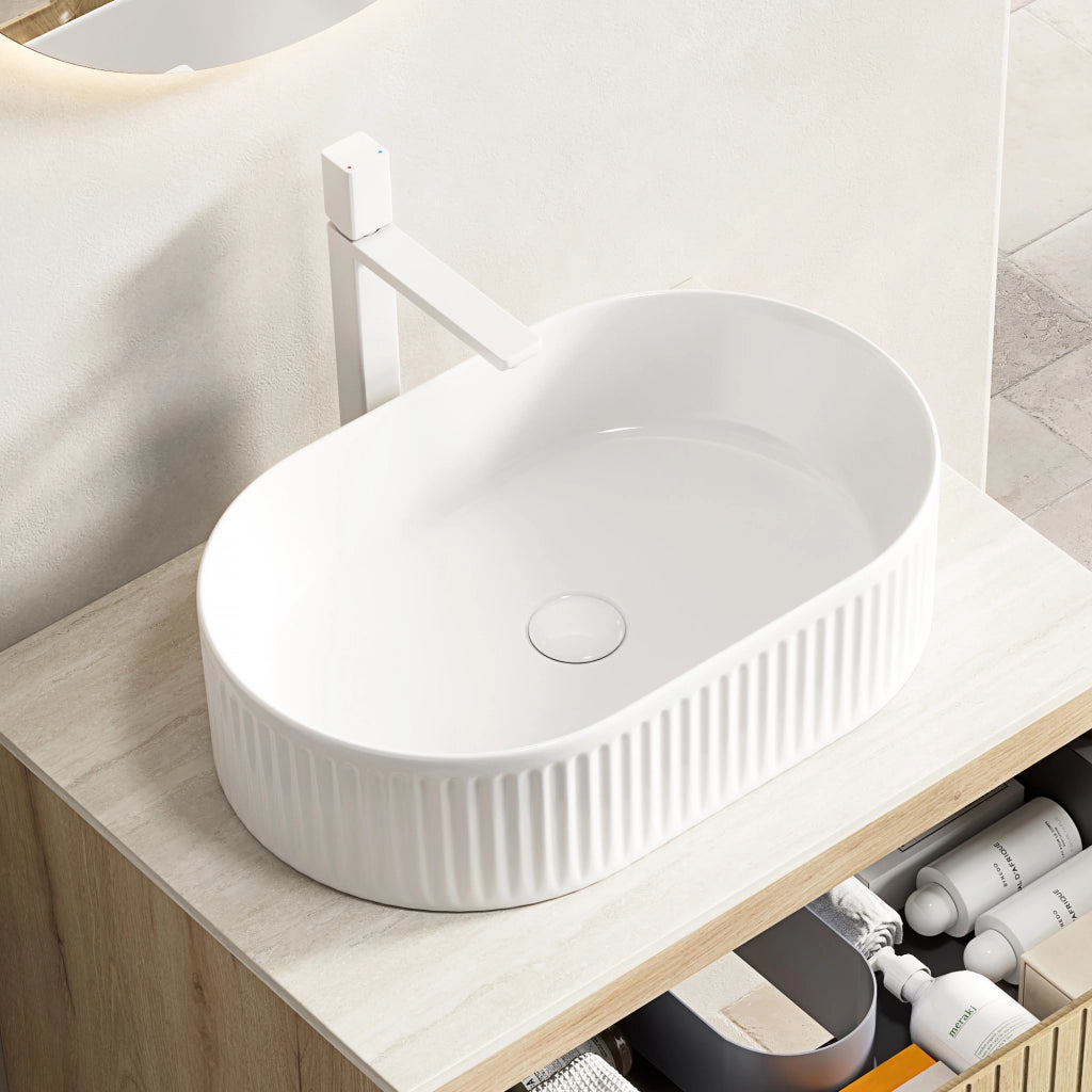 Lavabo da appoggio ovale bianco in ceramica