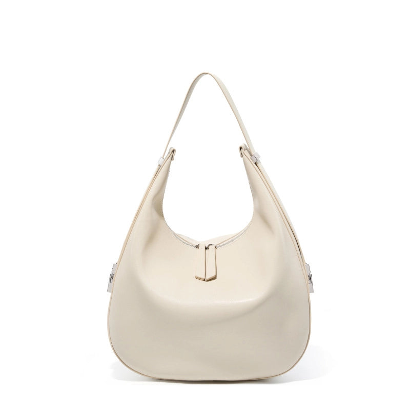Borsa a tracolla da donna in vera pelle con tracolla larga, colore bianco.