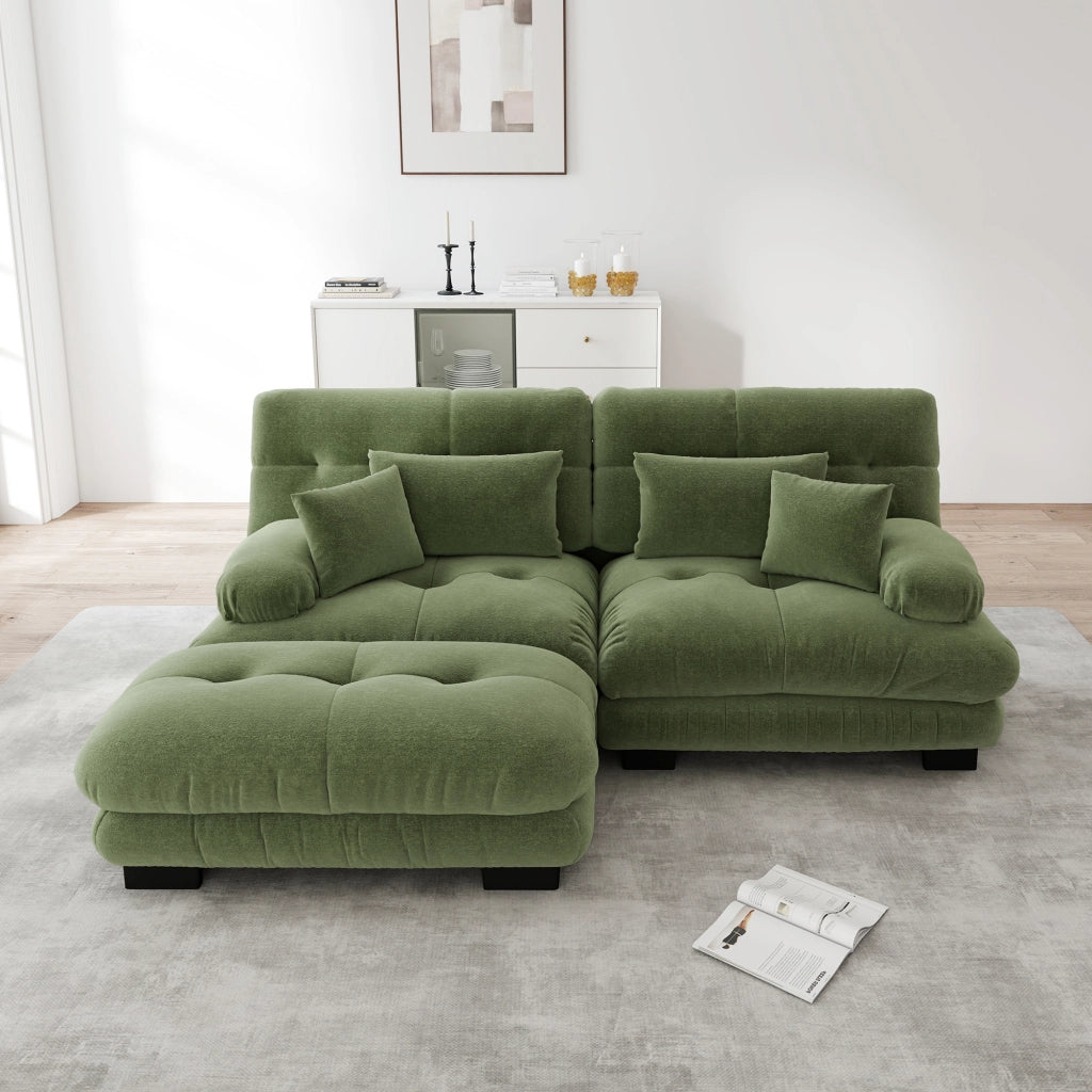Divano modulare in ciniglia verde con ottomane mobili e cuscini lombari per configurazioni lineari; a L o a U
