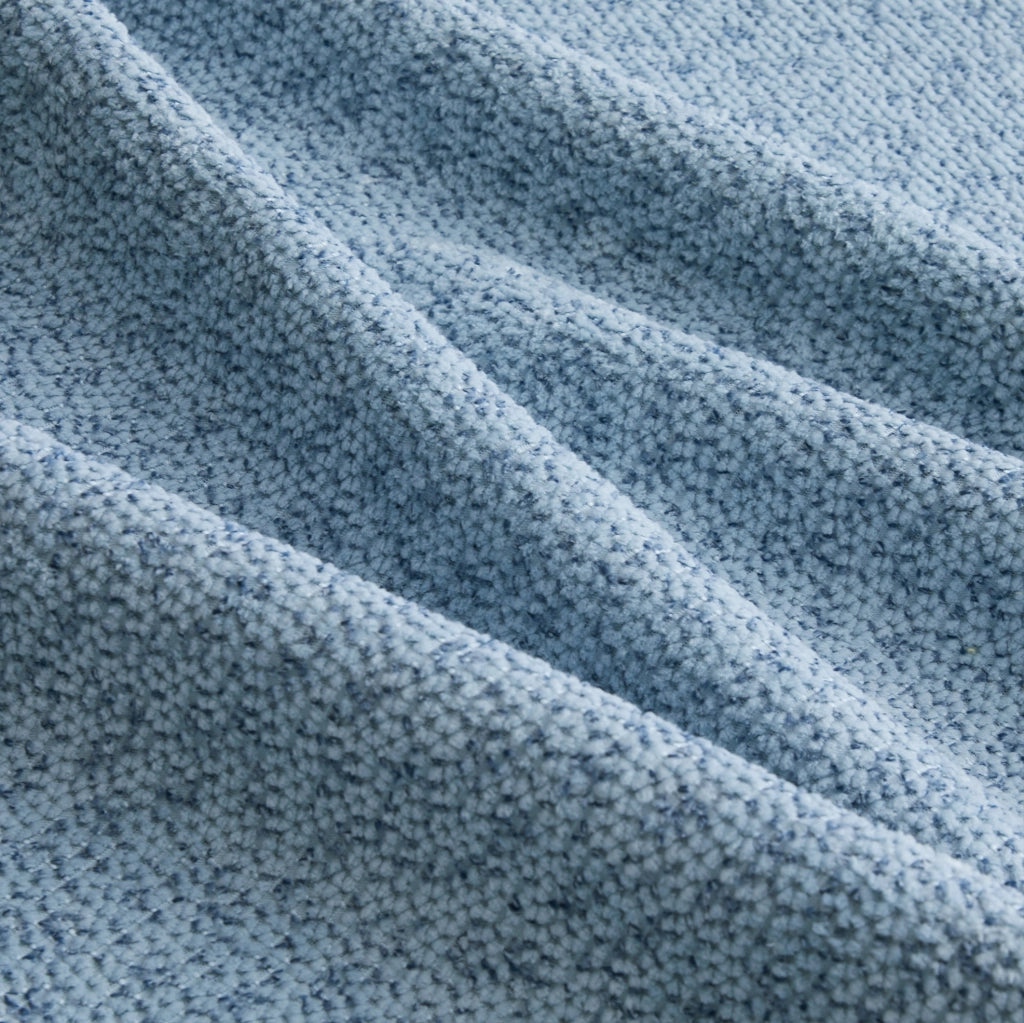 Divano modulare con ottomana in pile granulato blu