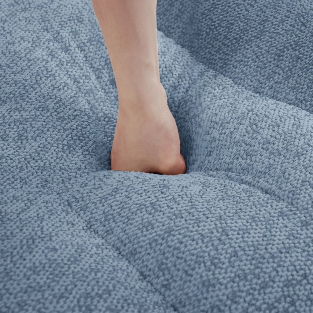 Divano modulare con ottomana in pile granulato blu