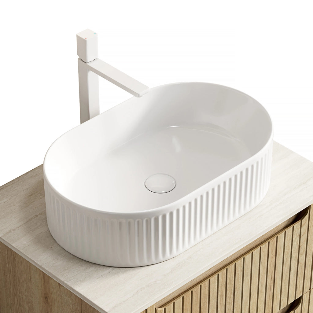 Lavabo da appoggio ovale bianco in ceramica