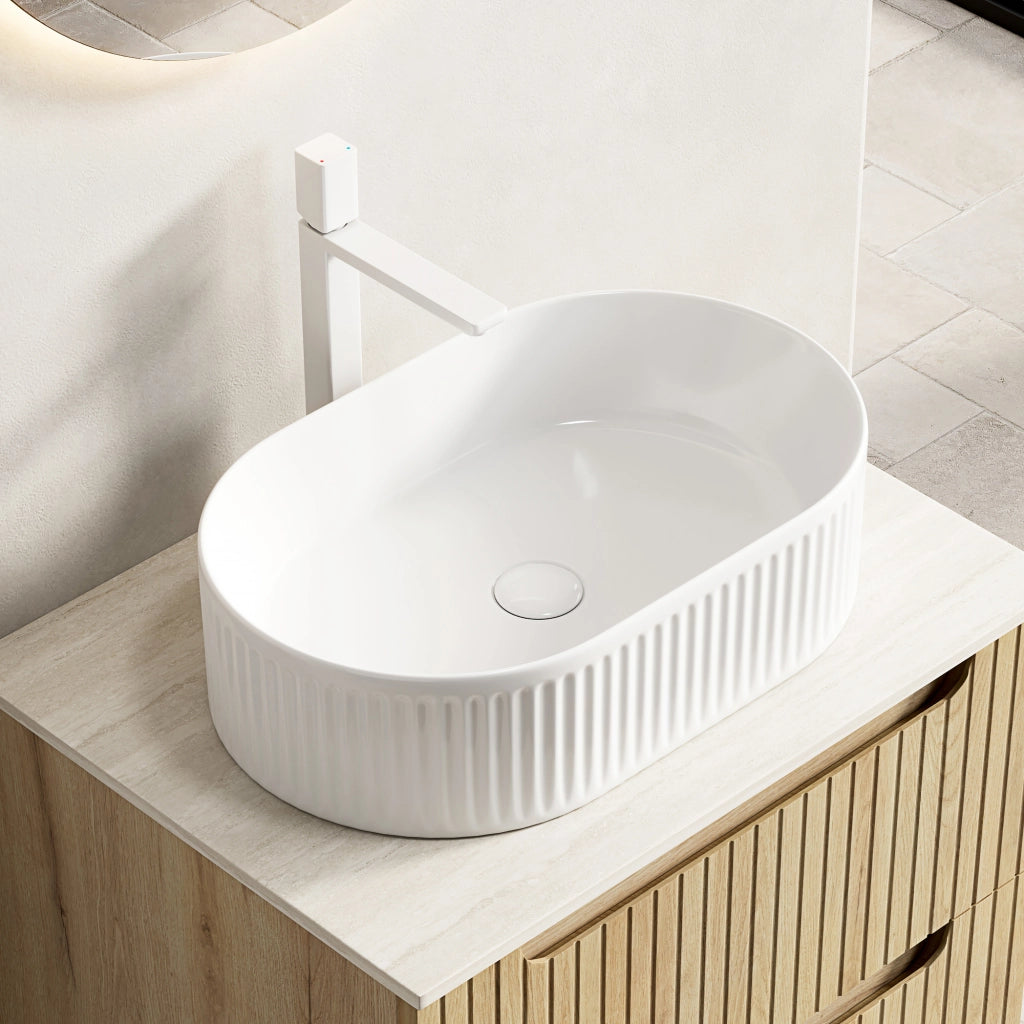 Lavabo da appoggio ovale bianco in ceramica