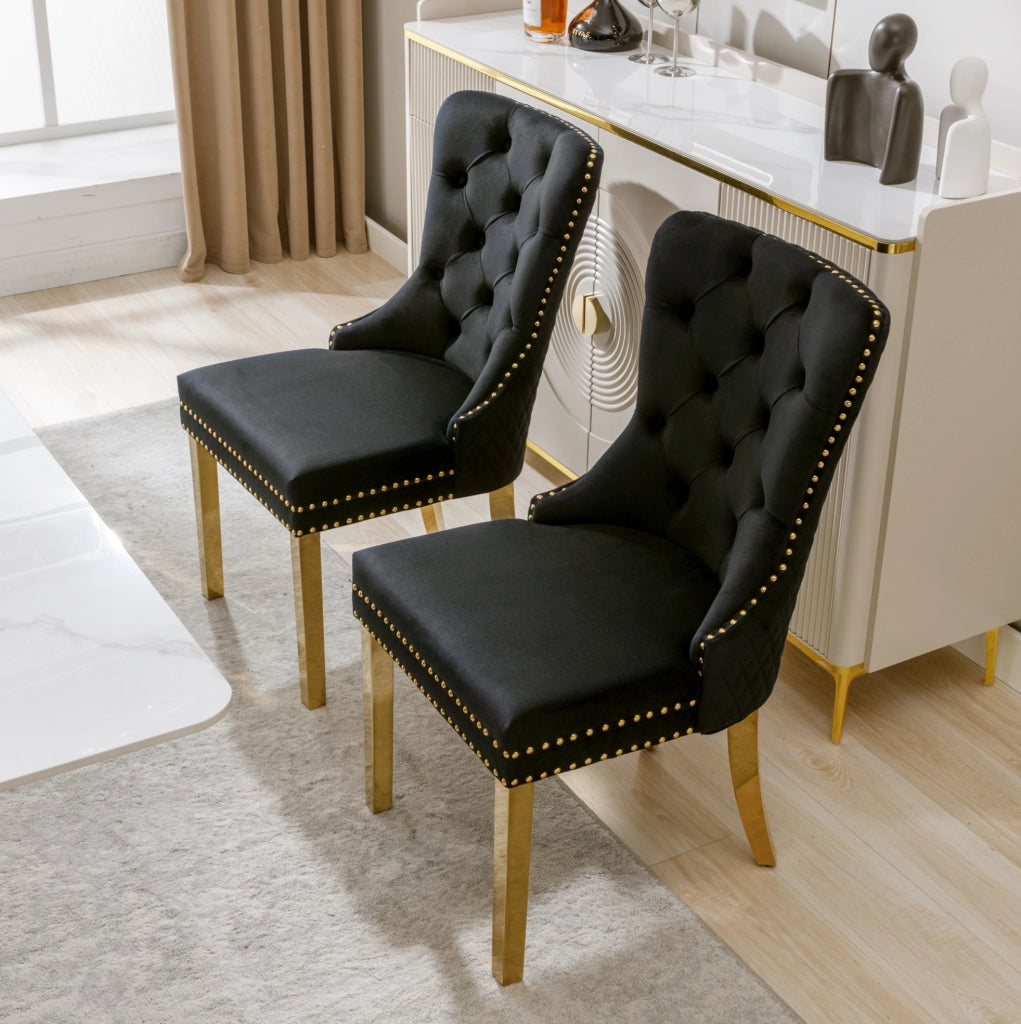 Sedia da pranzo in velluto nero con gambe in acciaio inox placcato oro