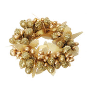 Giro candela con bacche colore oro