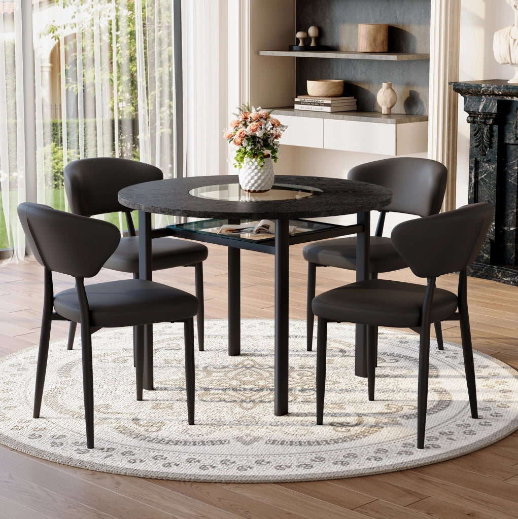 Set tavolo rotondo con 4 sedie nere in PU