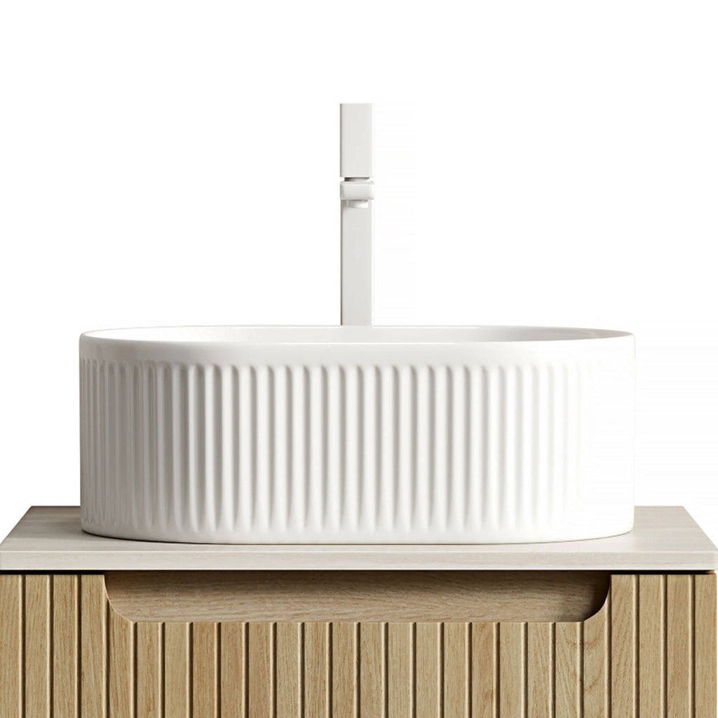 Lavabo da appoggio ovale bianco in ceramica