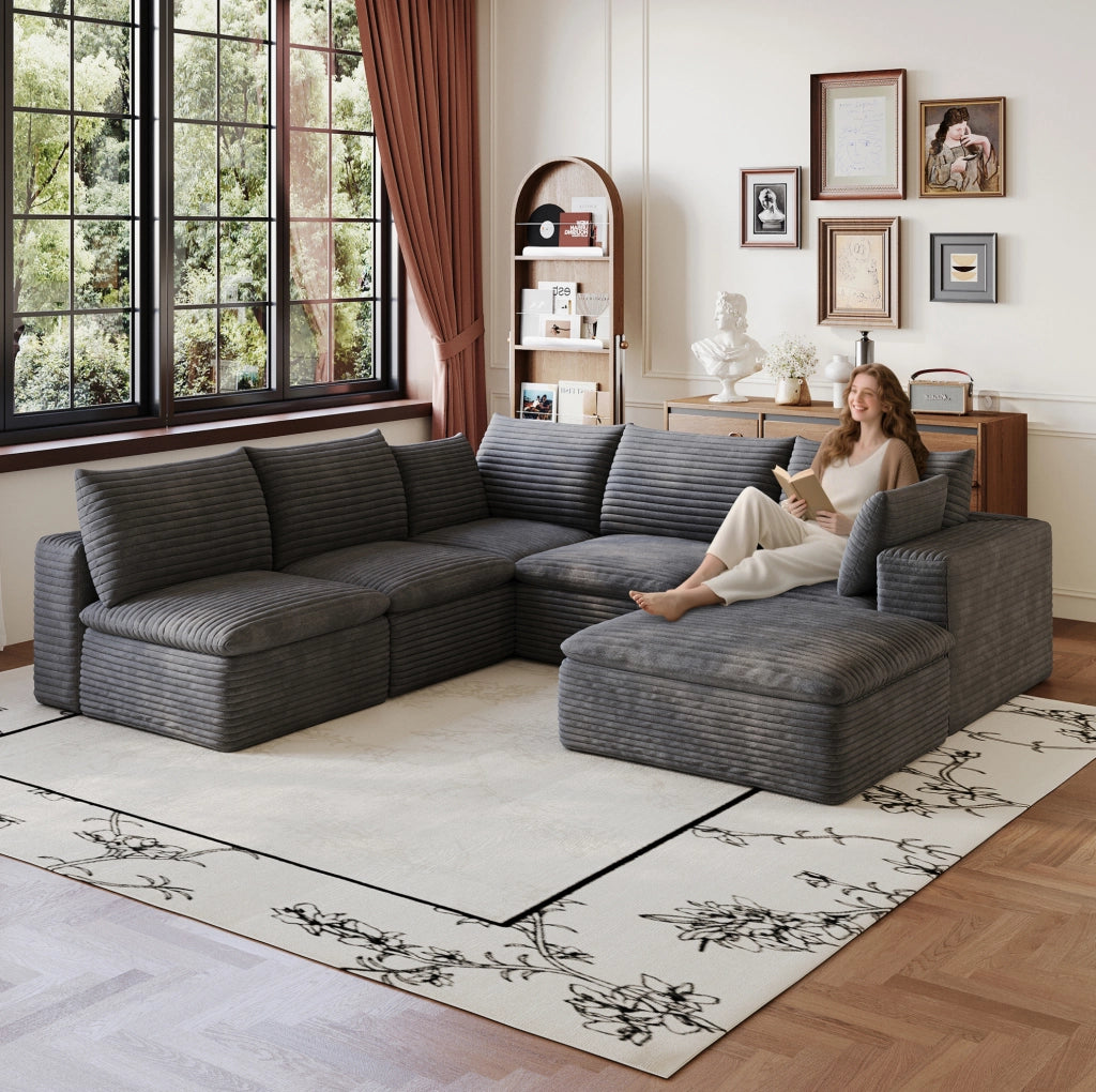 Divano modulare ULEVR in tessuto grigio scuro con supporto in schiuma e design componibile