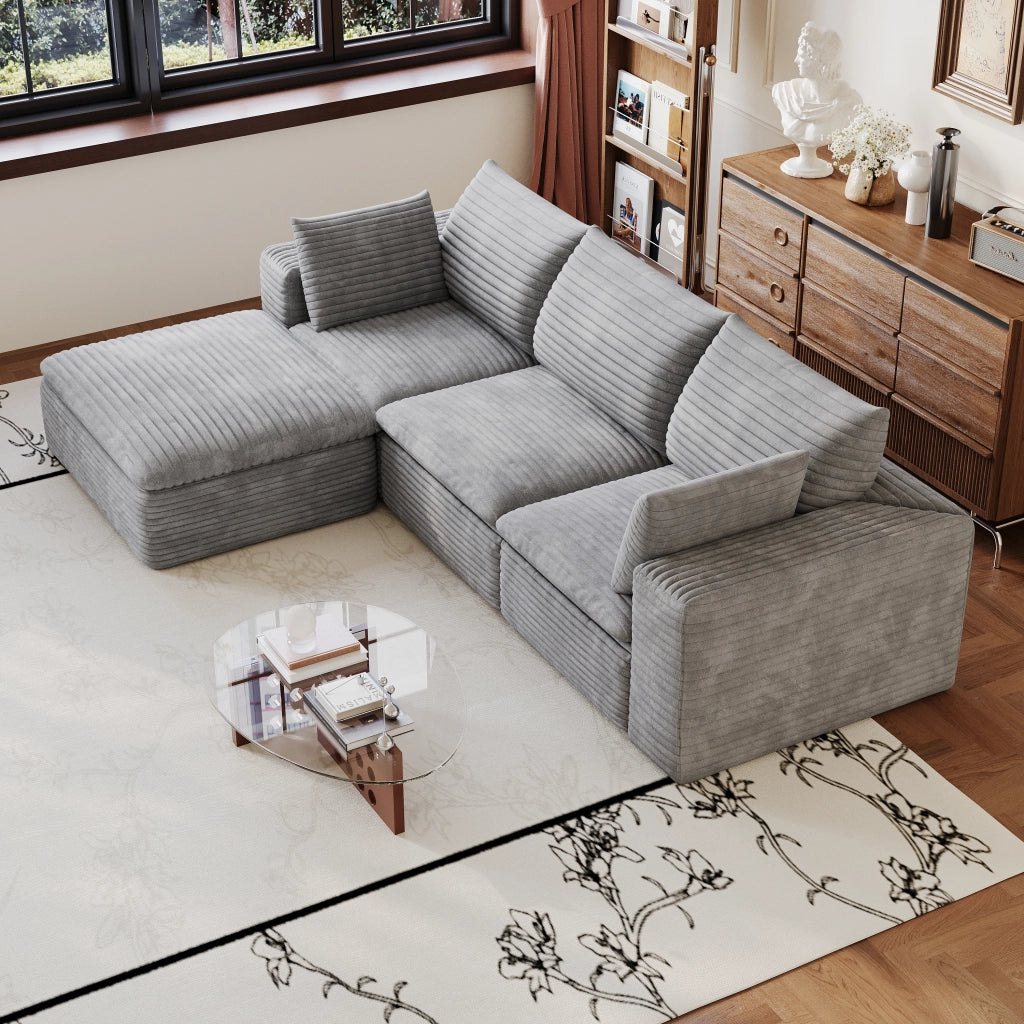 Divano modulare in tessuto grigio con supporto in schiuma e design componibile
