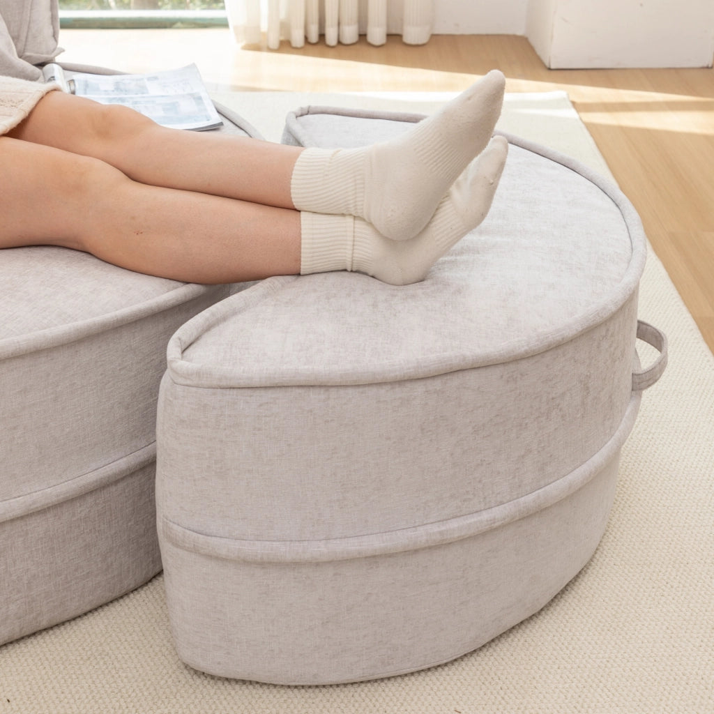 Poltrona lounge rotonda moderna con pouf e 5 cuscini in ciniglia grigia