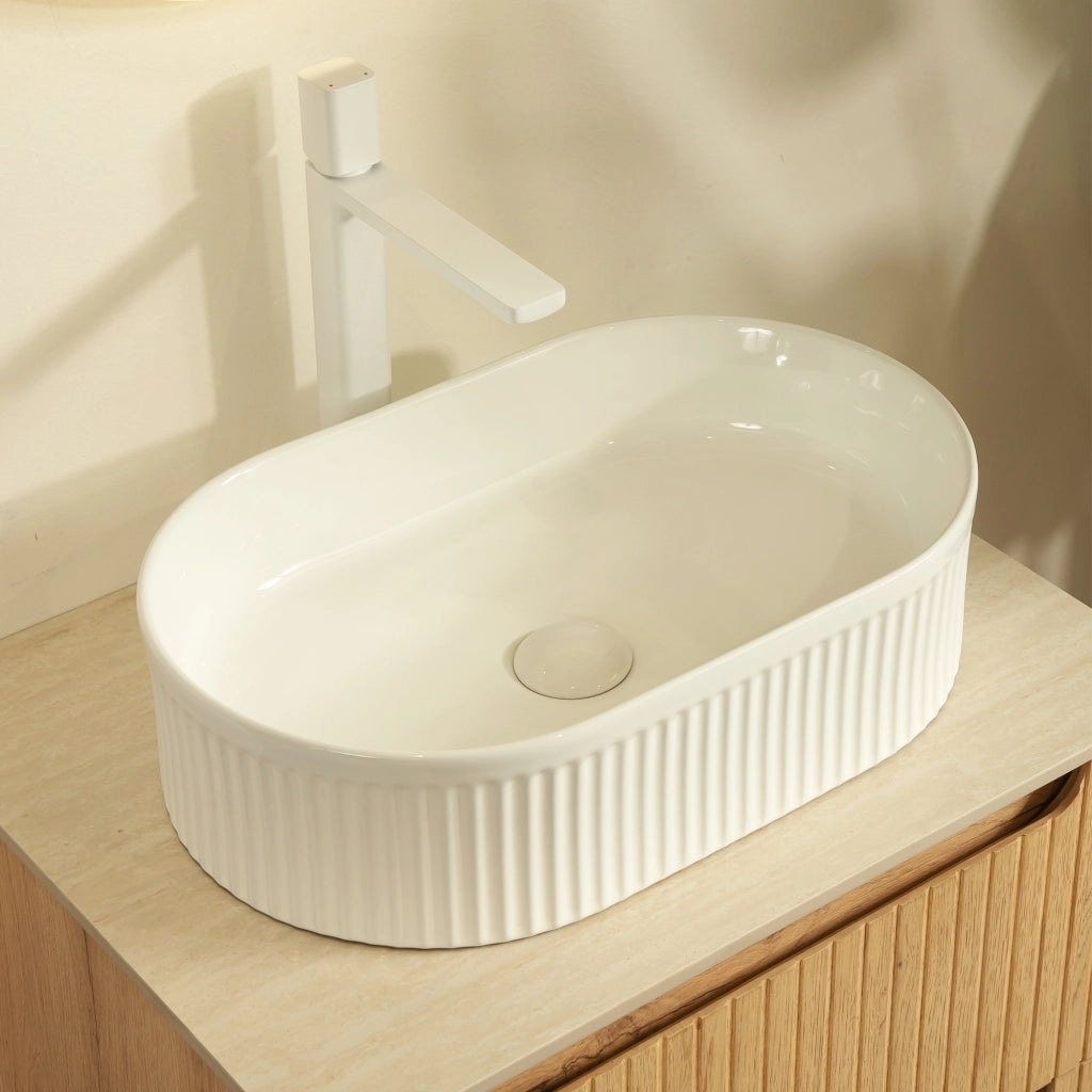 Lavabo da appoggio ovale bianco in ceramica