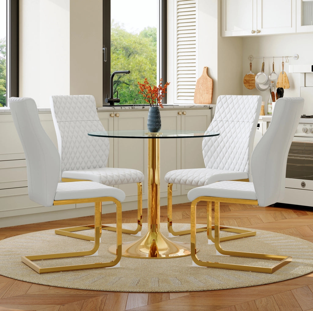 Set da pranzo con tavolo rotondo in vetro temperato ø 85 cm e 4 sedie bianche con dettagli oro