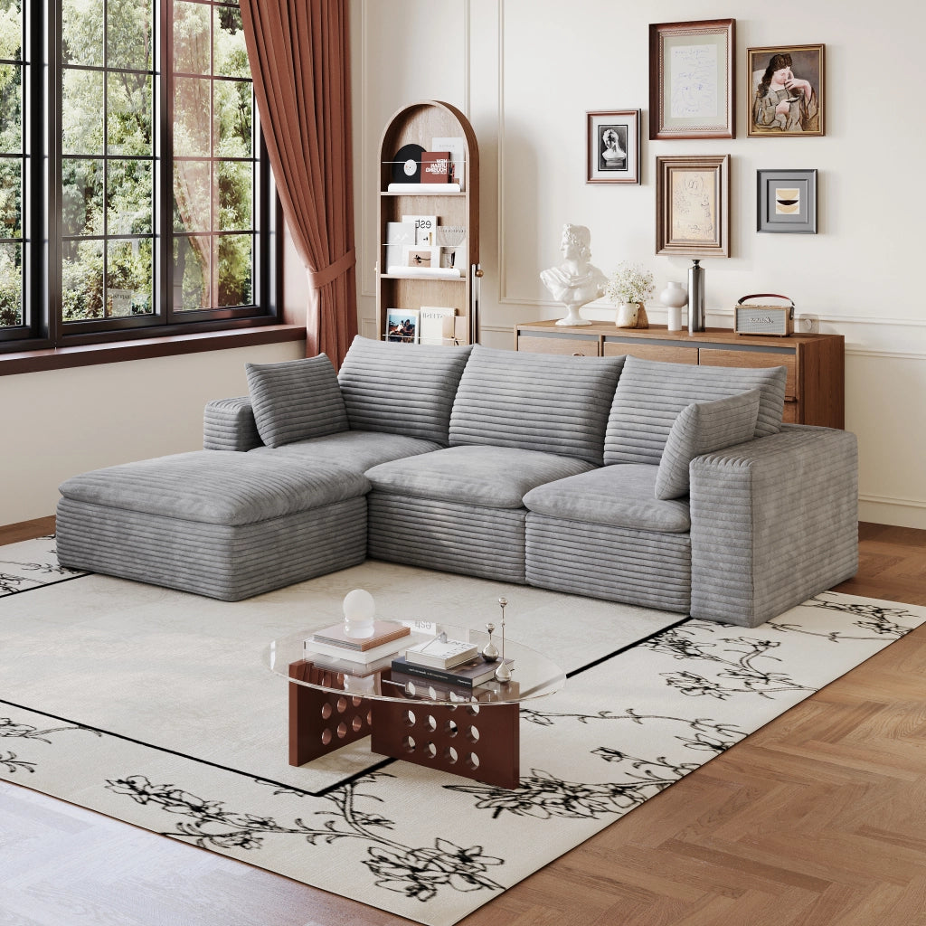 Divano modulare in tessuto grigio con supporto in schiuma e design componibile