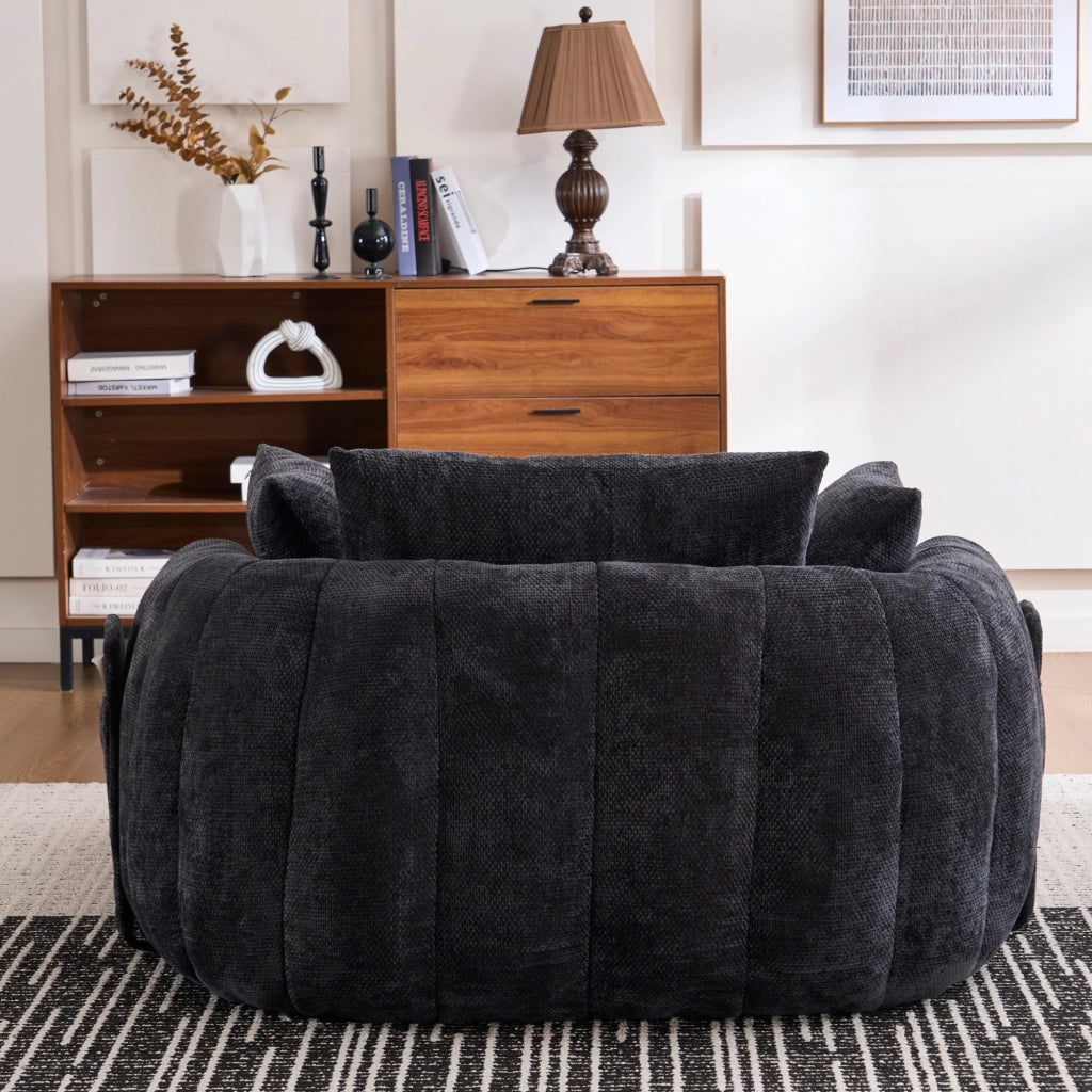 Poltrona chaise longue da interno con seduta profonda e cuscini, in chenille nera