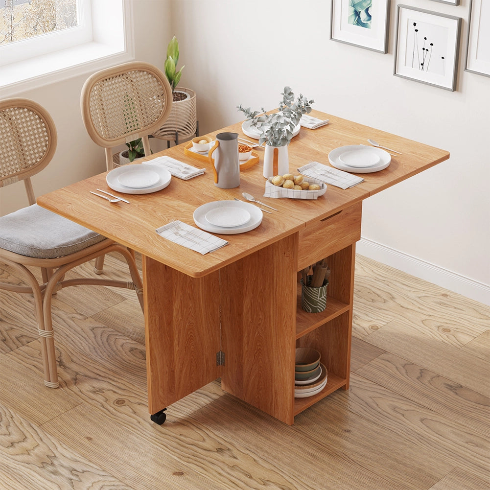 Tavolo da Pranzo Pieghevole Salvaspazio Legno 2 Ruote Casa Ufficio 120x77x75cm