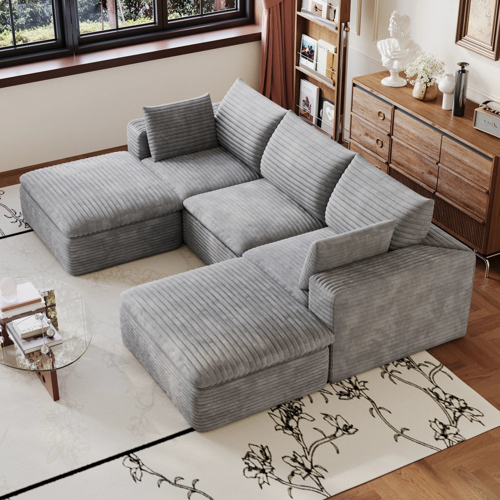 Divano modulare in tessuto grigio con supporto interamente in schiuma e moduli regolabili consegnato in 3 colli