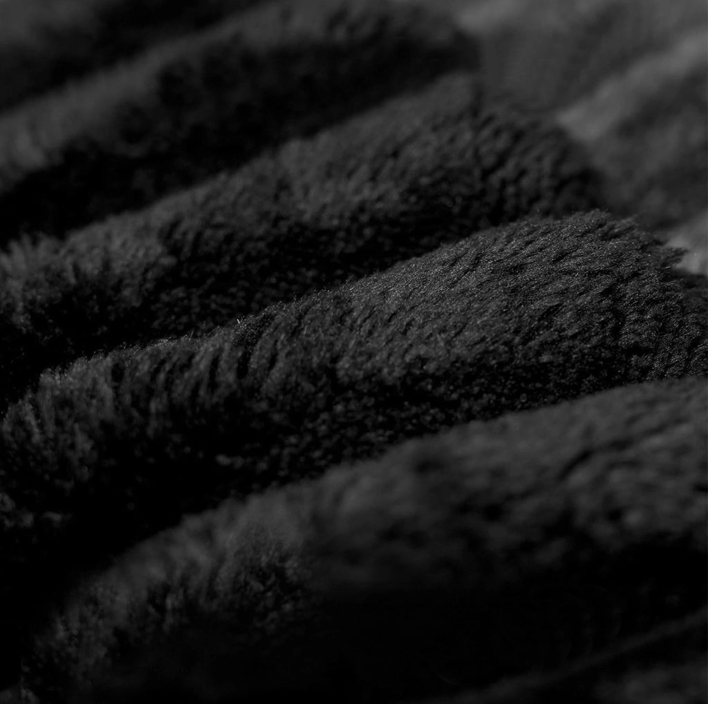 Pouf imbottito senza montaggio in tessuto nero