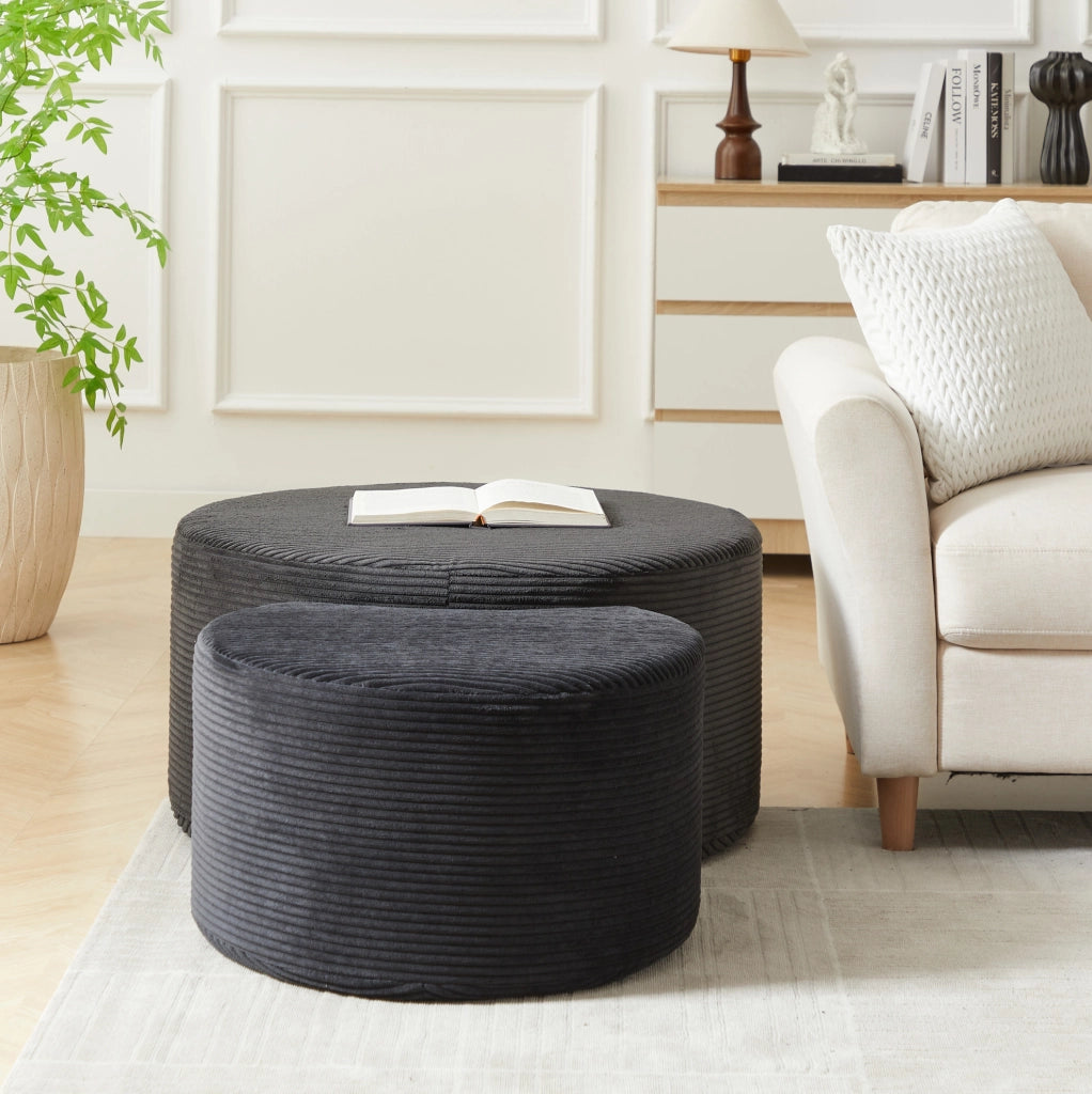 Set 2 tavolini pouf in tessuto nero; senza montaggio