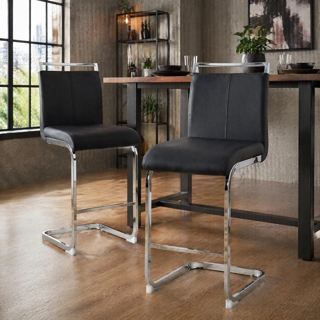 Set di 2 sgabelli da bar in PU nero con gambe in metallo argento, stile nordico