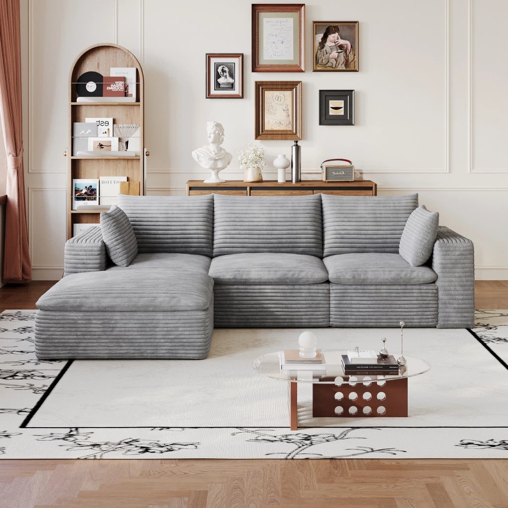 Divano modulare in tessuto grigio con supporto in schiuma e design componibile