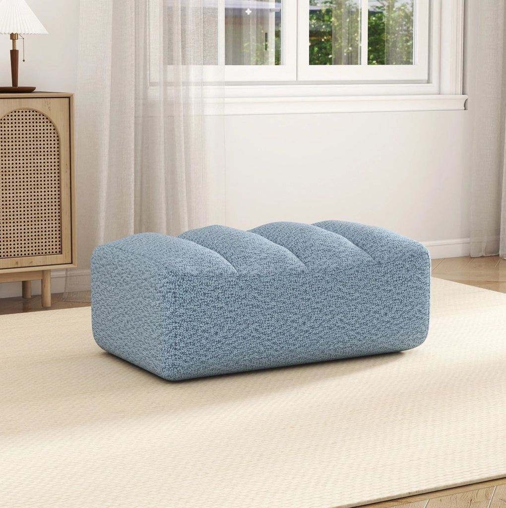 Divano modulare con ottomana in pile granulato blu